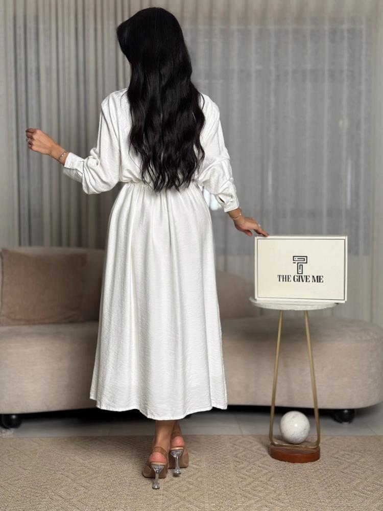 Dress with embroidery on the shoulders and elastic waist