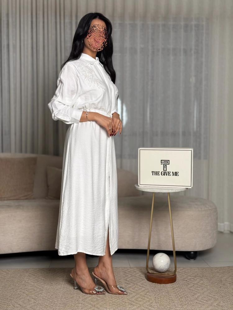 Dress with embroidery on the shoulders and elastic waist