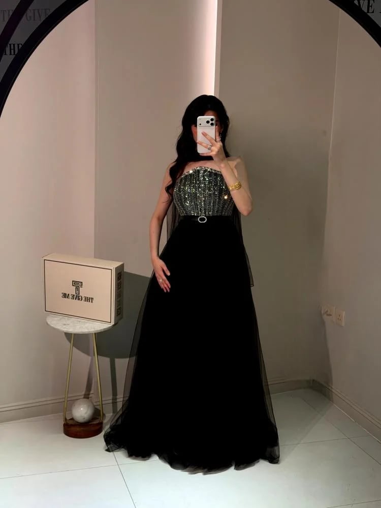 فستان سهره بتطريزات براقه بحزام رفيع ناعم