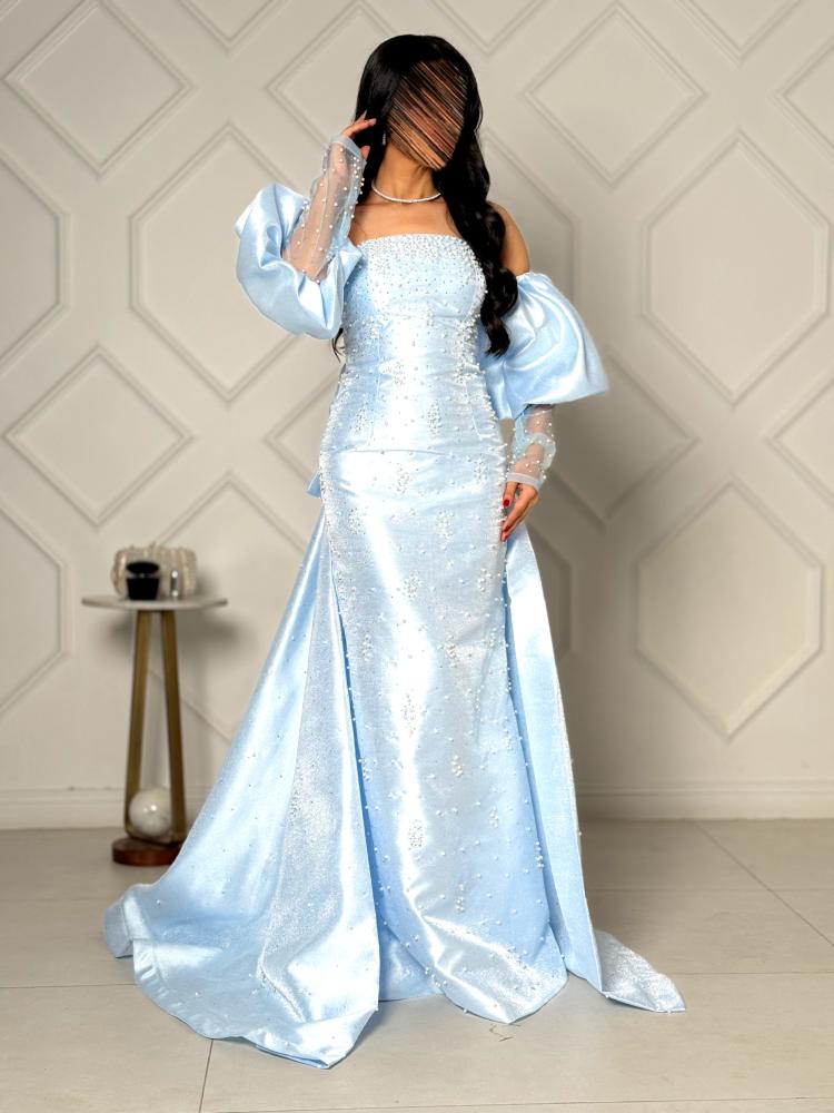 Light blue evening dress embroidered with puffed sleeves