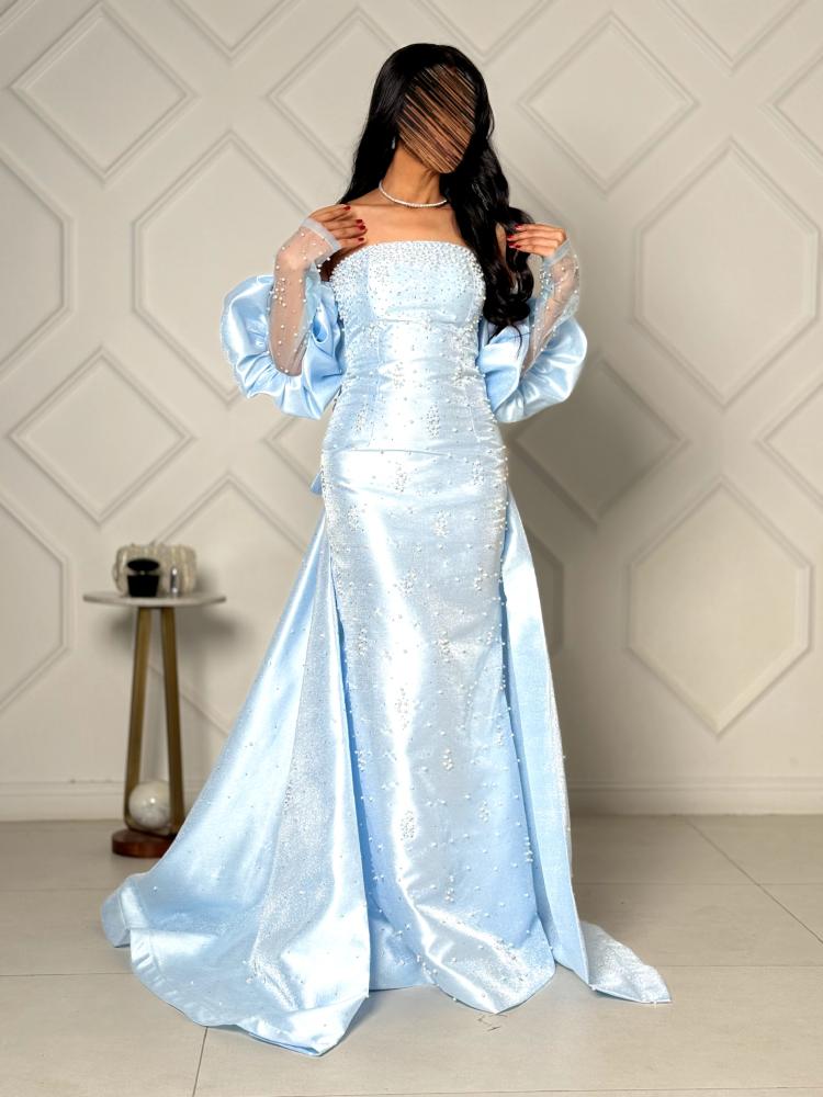 Light blue evening dress embroidered with puffed sleeves