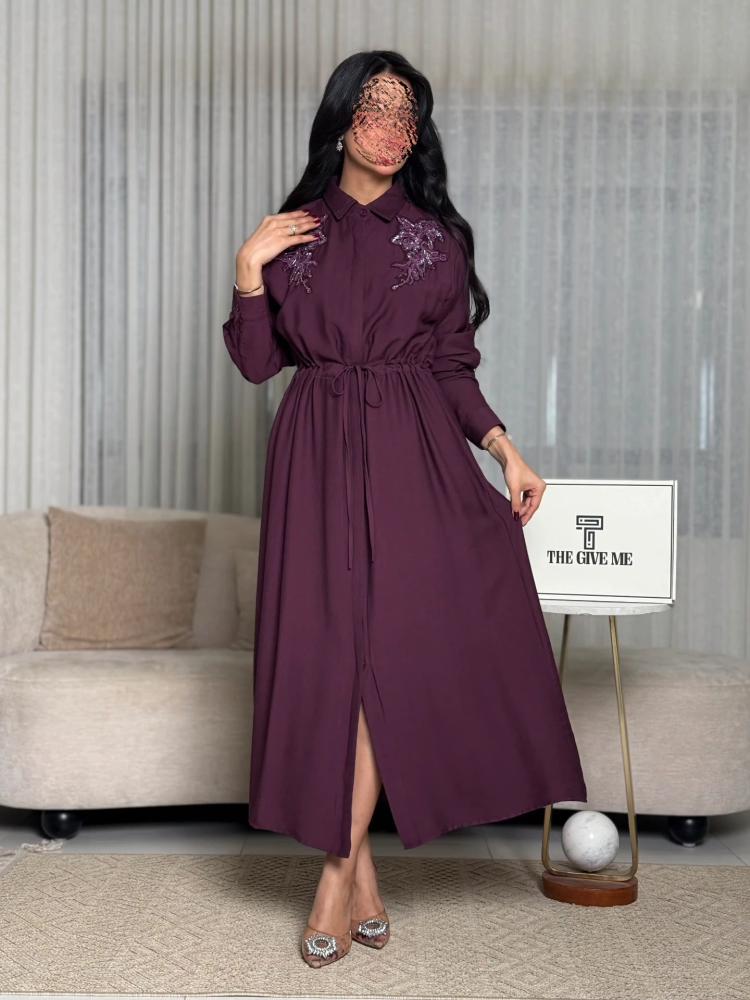 Dress with embroidery on the shoulders and elastic waist