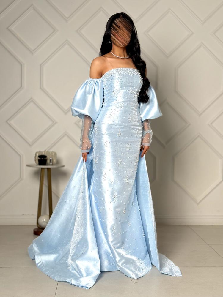 Light blue evening dress embroidered with puffed sleeves