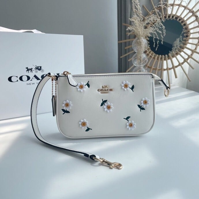 Coach wallet with daisy embroidery