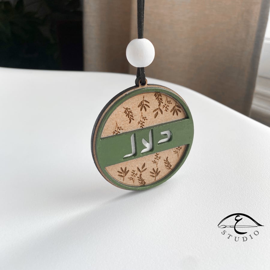 A pendant with a flower design