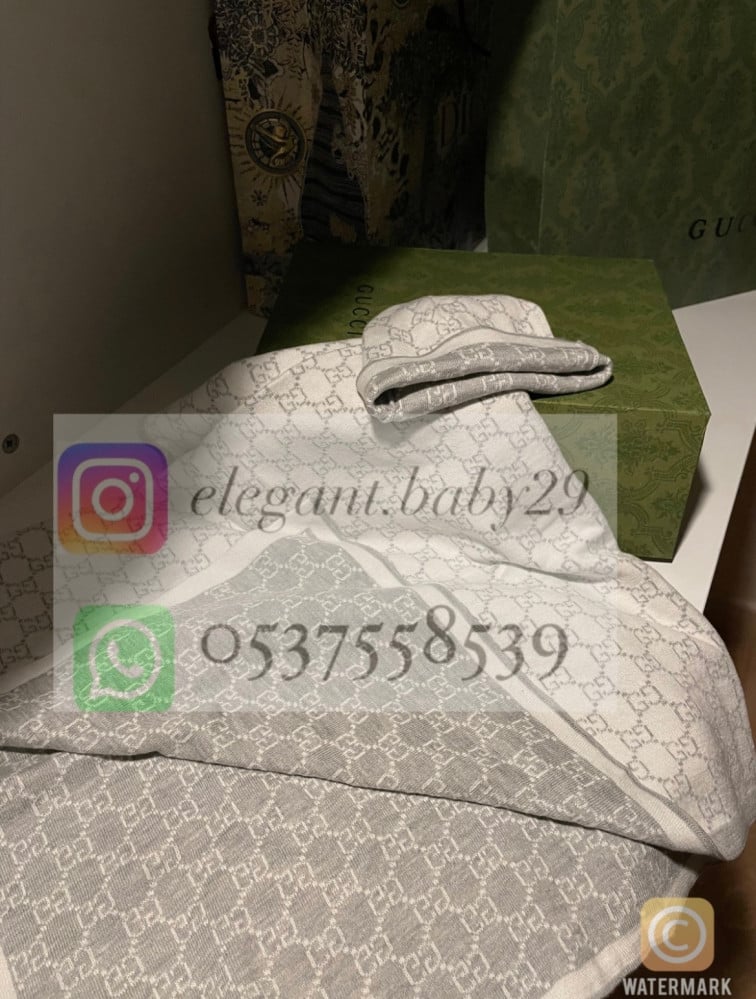 بطانيه قوتشي رمادي +كاب مع كيس الماركه