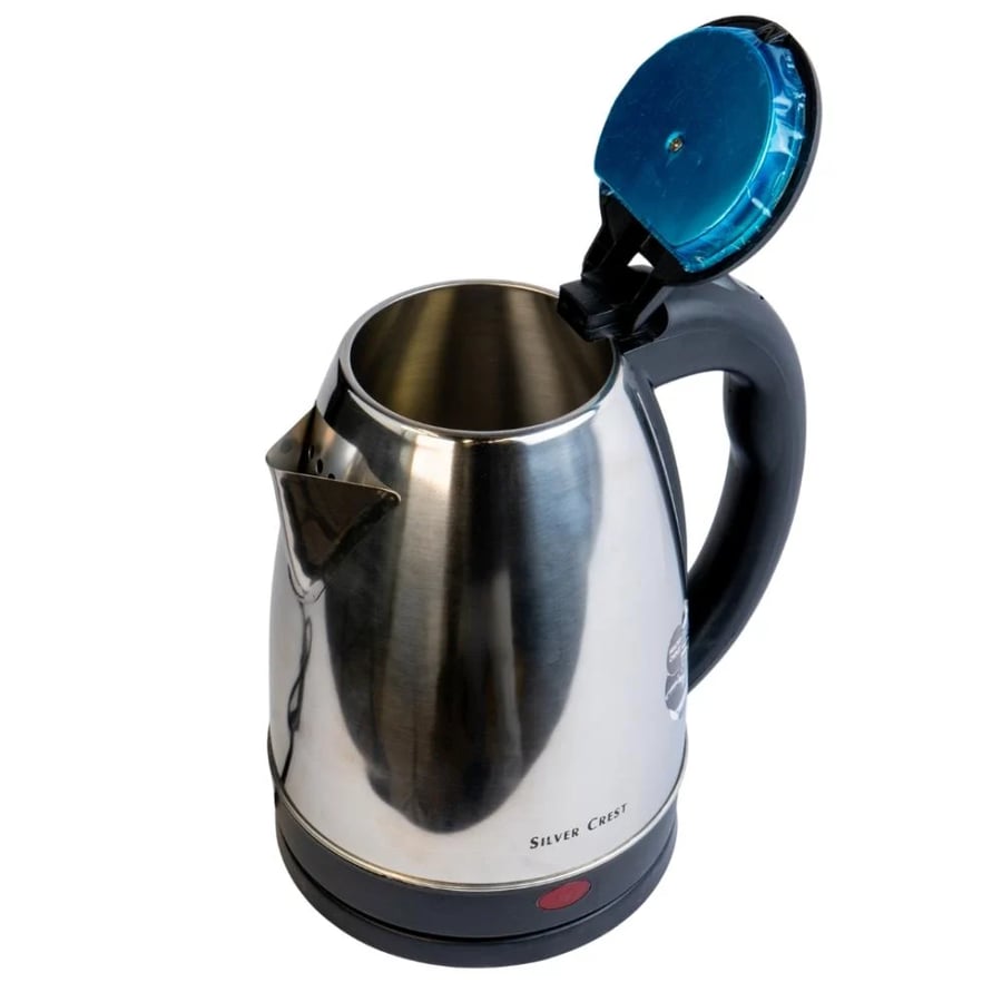 Silver and black electric kettle brand Silver Crest for kitchen use