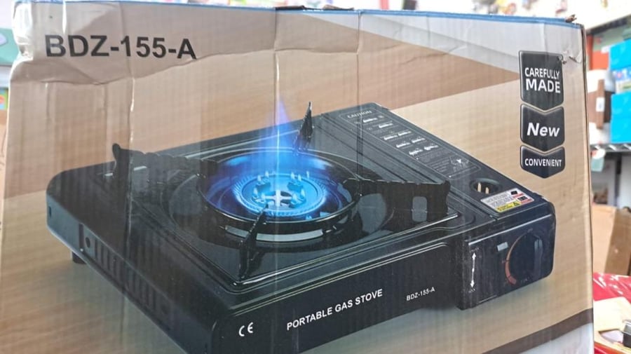 A portable stove for trips comes inside a cardboard box