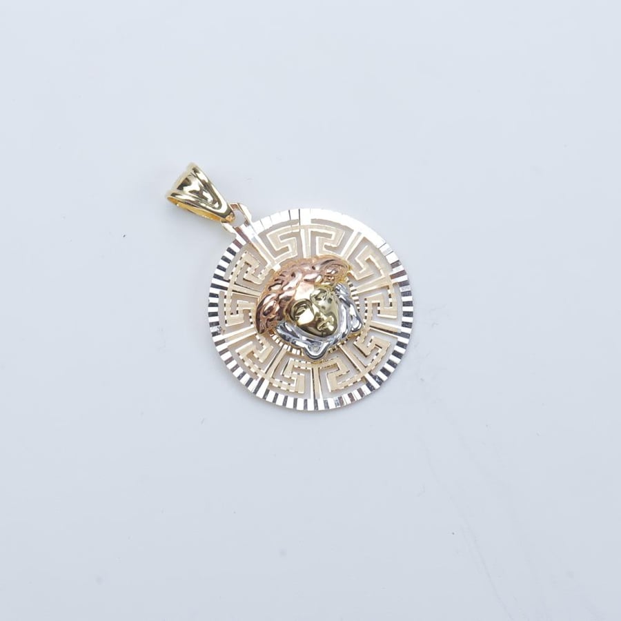 Pendant with chain, Versace design, 18 karat gold, weighing 6.94 grams