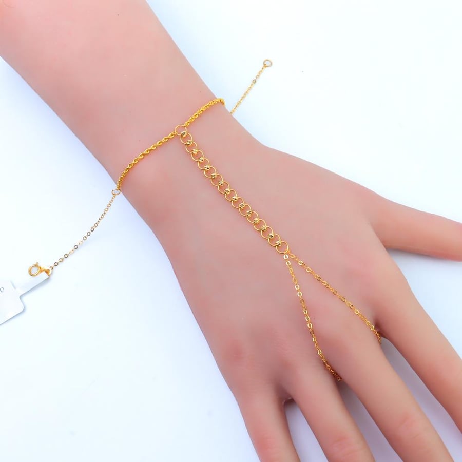 A gold-plated Doric gold hand weighing 2.65 grams