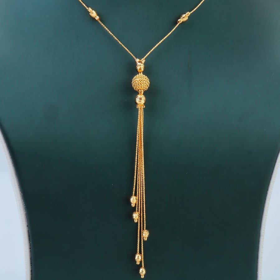 21-karat gold bubble core necklace, weighing 7.3 grams