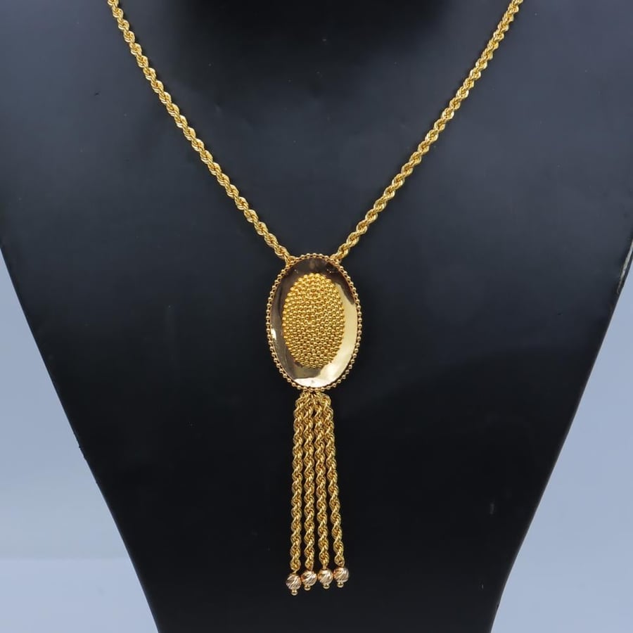 21-karat gold fingerprint rosary, weighing 9.15 grams
