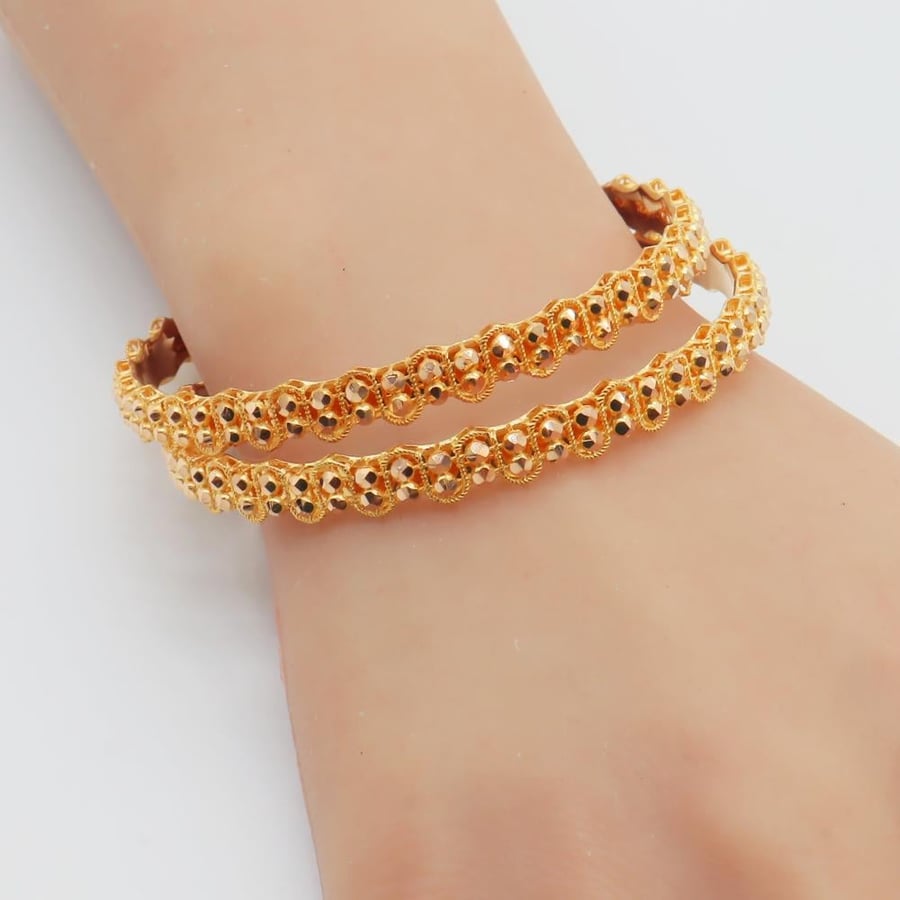 21-karat gold Doric wavy bangles