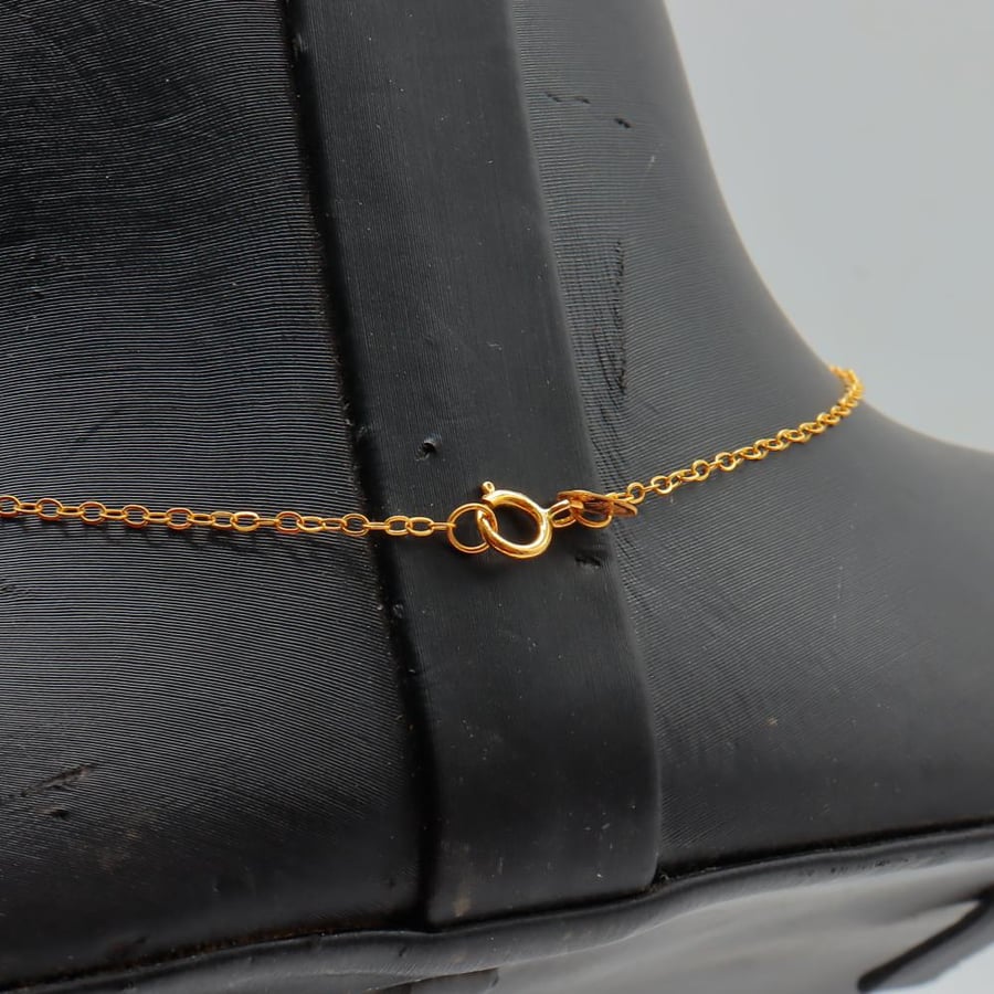 21-karat gold rosary weighing 2.56 grams