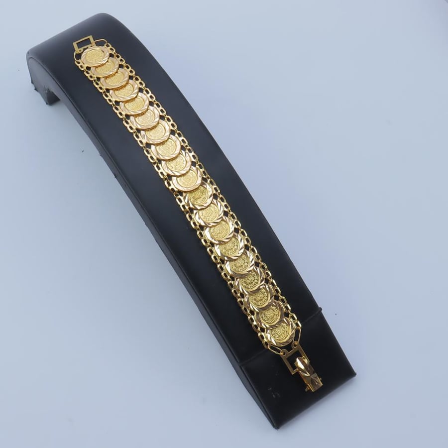 21-karat gold fairy design bracelet, weighing 13.2 grams
