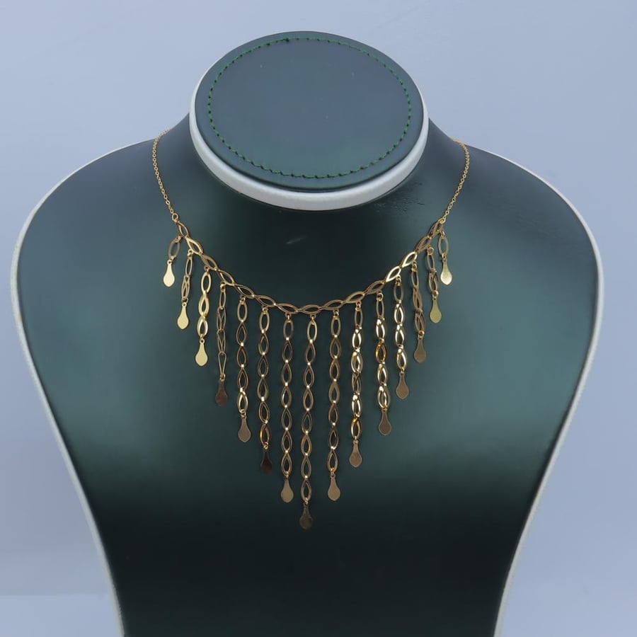 21-karat gold eyelash choker, weighing 3 grams