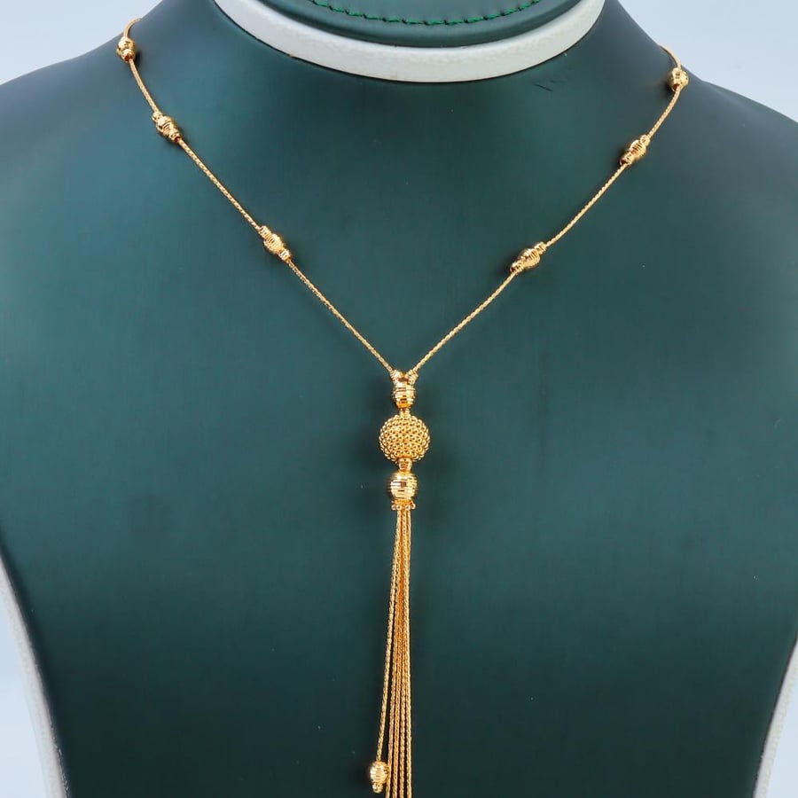21-karat gold bubble core necklace, weighing 7.3 grams