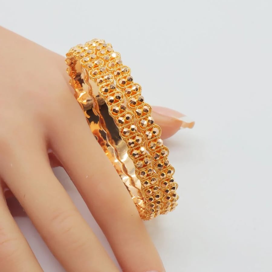 21-karat gold Doric wavy bangles