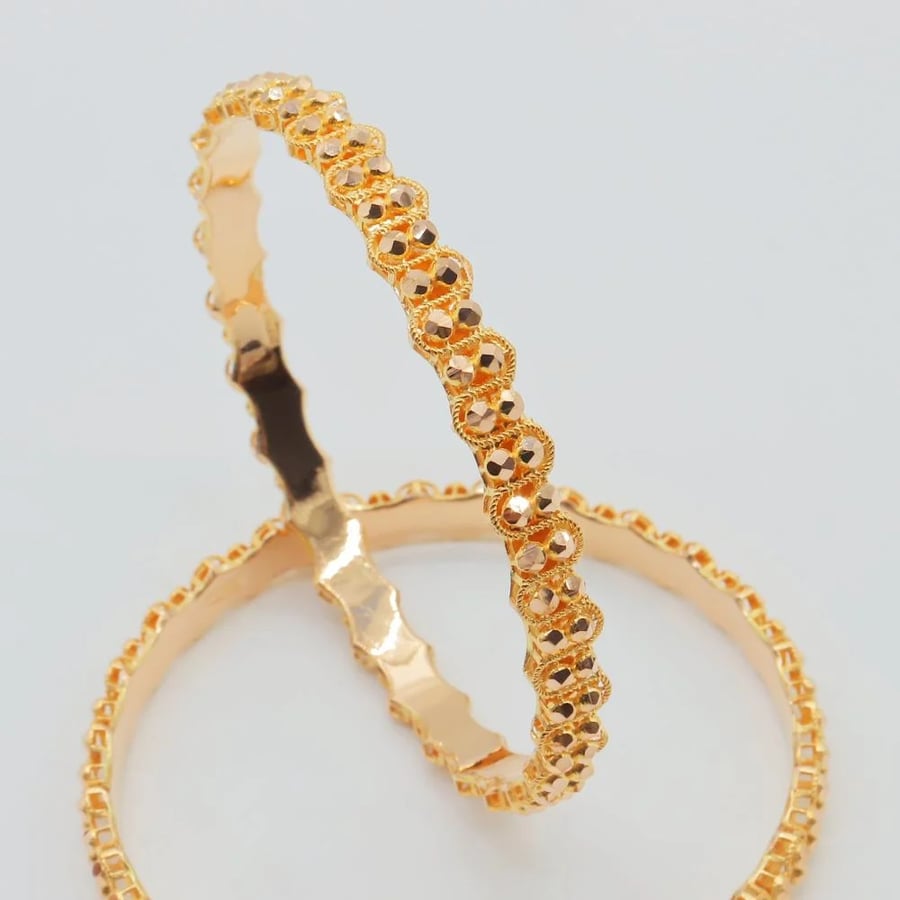21-karat gold Doric wavy bangles