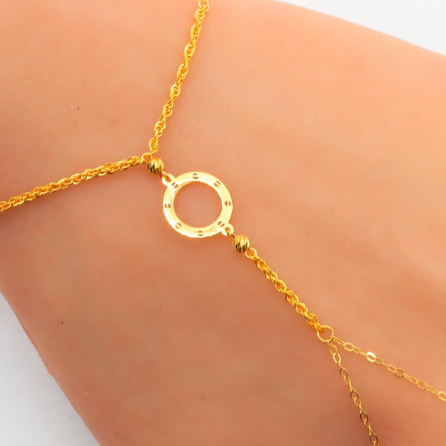 A fine gold palm, 21 karat, weighing 1.05 grams
