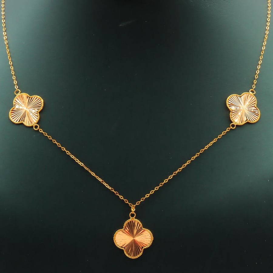 Three rose gold necklace, 21 karat, weighing 3.2 grams