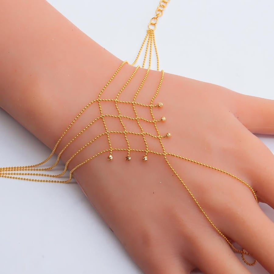 كف ذهب عيار 21 بتصميم مفرغ يملي العين