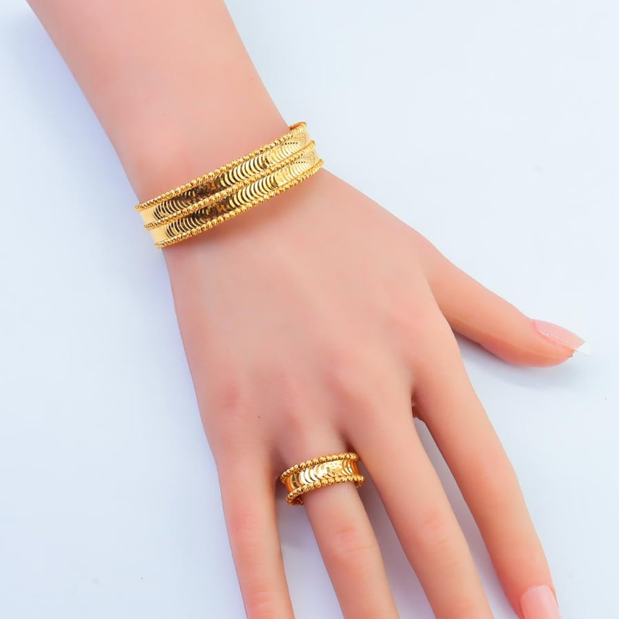 Doric gold bracelet with a double ring, 21 karat, weighing 18.67 grams