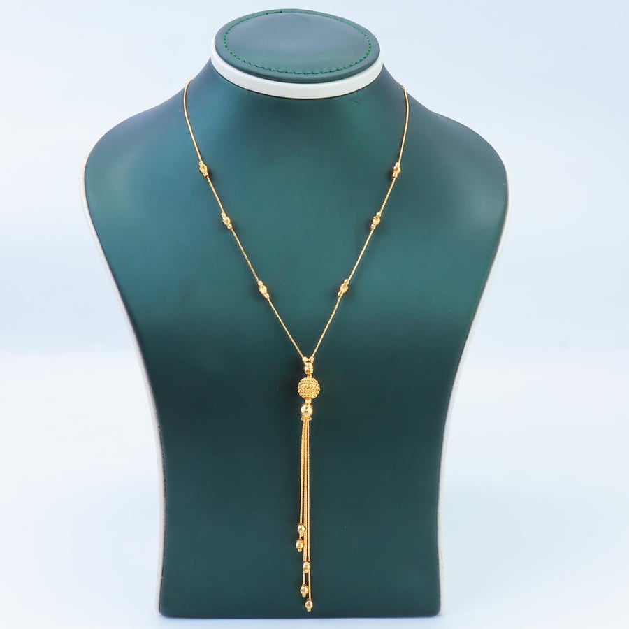 21-karat gold bubble core necklace, weighing 7.3 grams