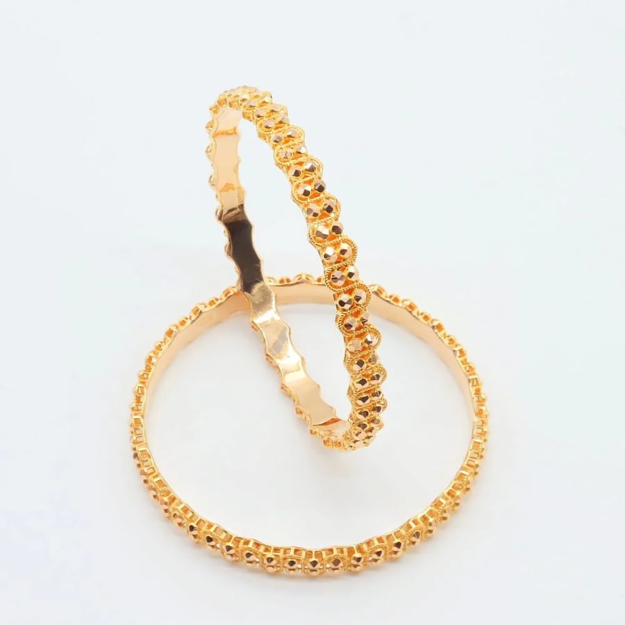 21-karat gold Doric wavy bangles