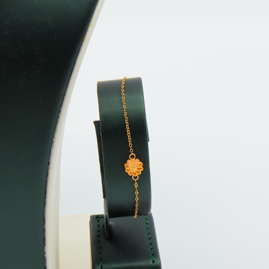 Four-tier rose gold set, 21 karat, weighing 10.5 grams