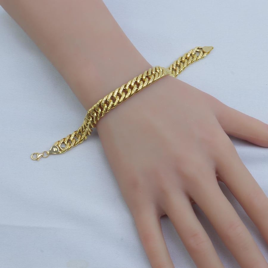 18k gold chain bracelet, reversible, weighing 7.2 grams