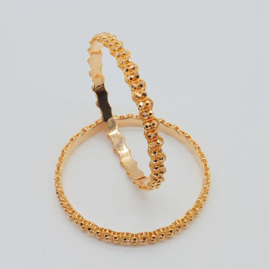 21-karat gold Doric wavy bangles