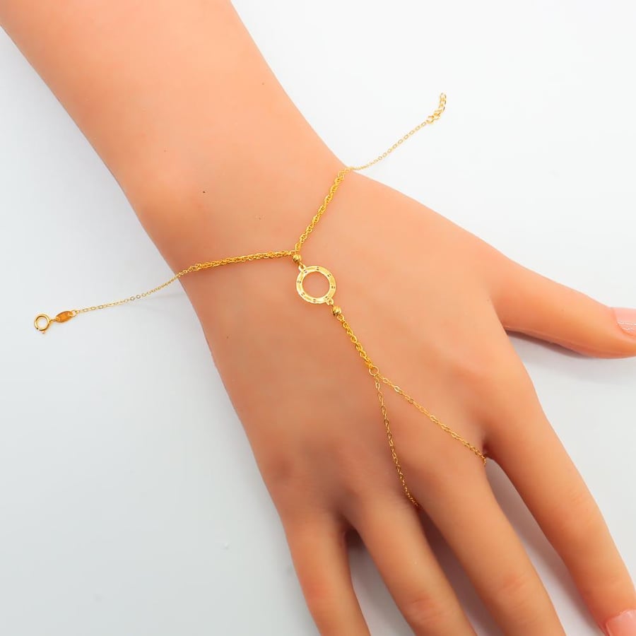 A fine gold palm, 21 karat, weighing 1.05 grams