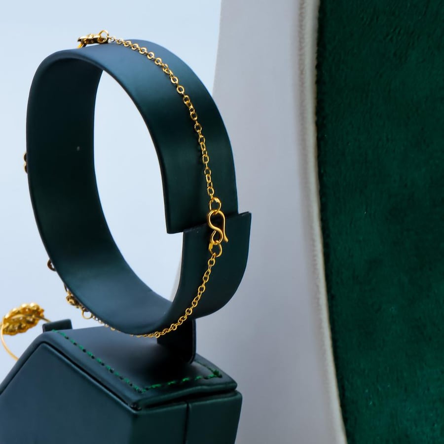 Jaber chair gold set, 21 karat, weighing 12.8 grams