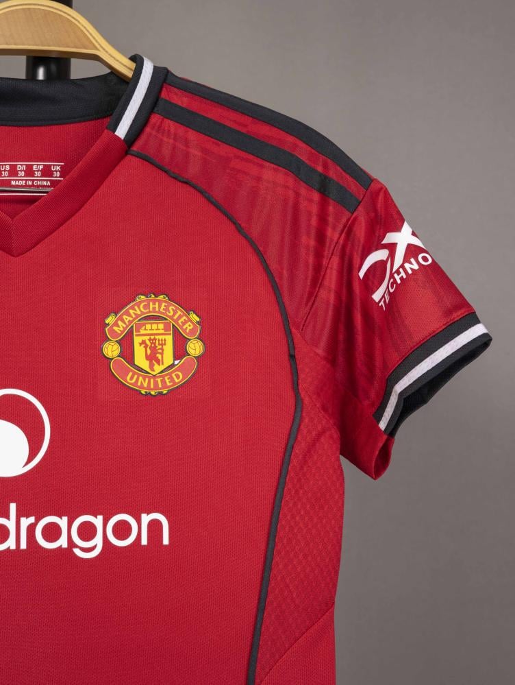 Manchester United main kit children 25/26