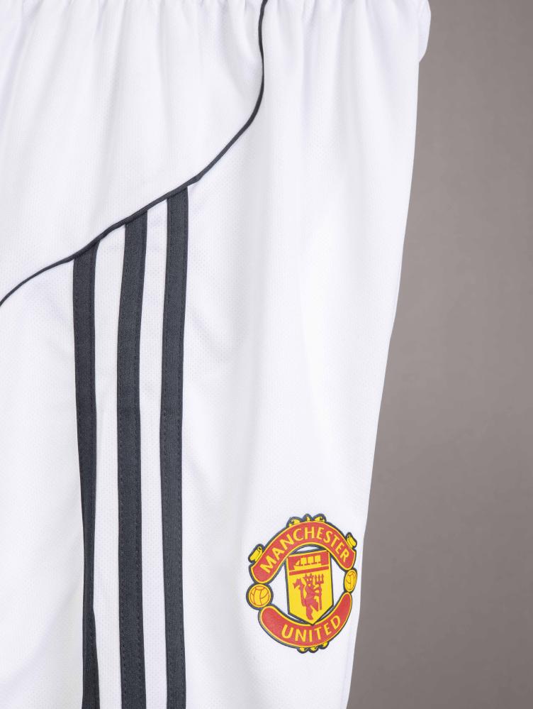 Manchester United main kit children 25/26