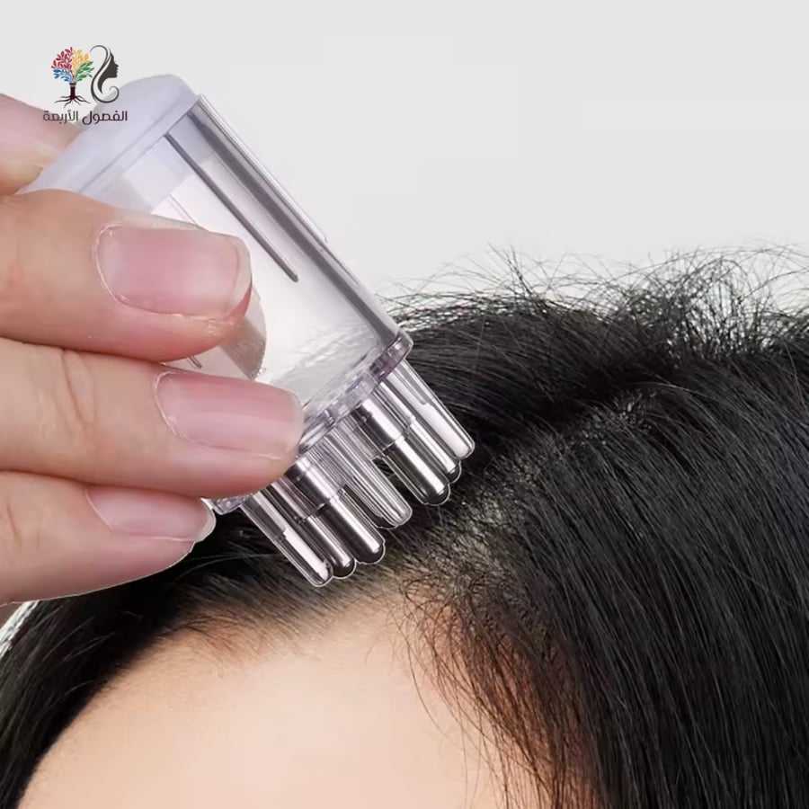 أداة توزيع زيت الشعر