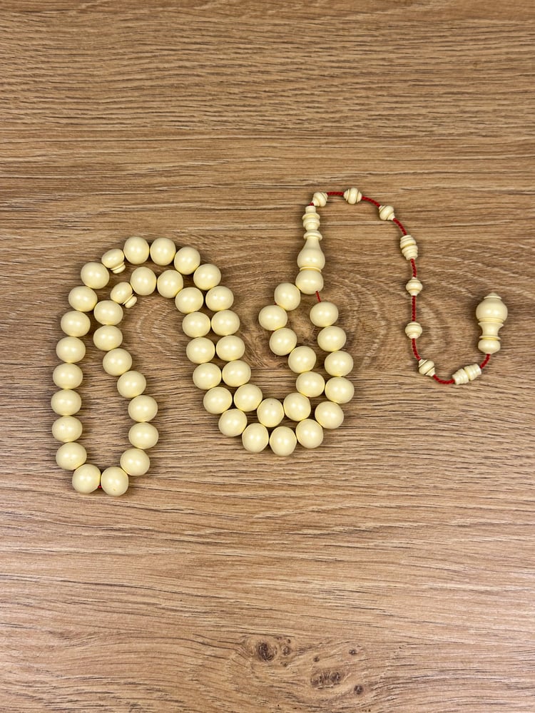 سبحة دومنة تمليكة ستات حزوز خراطة الافوكاتو (١٢*١٠ ملم  - ٤٩ خرزة)