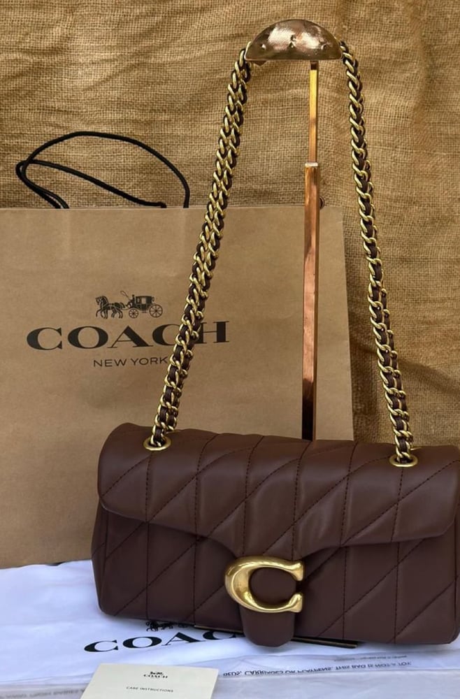 حقيبة كتف نسائية لون بني ايقونية