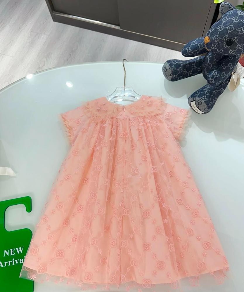 Gucci dress with embroidered fabric and brand logo