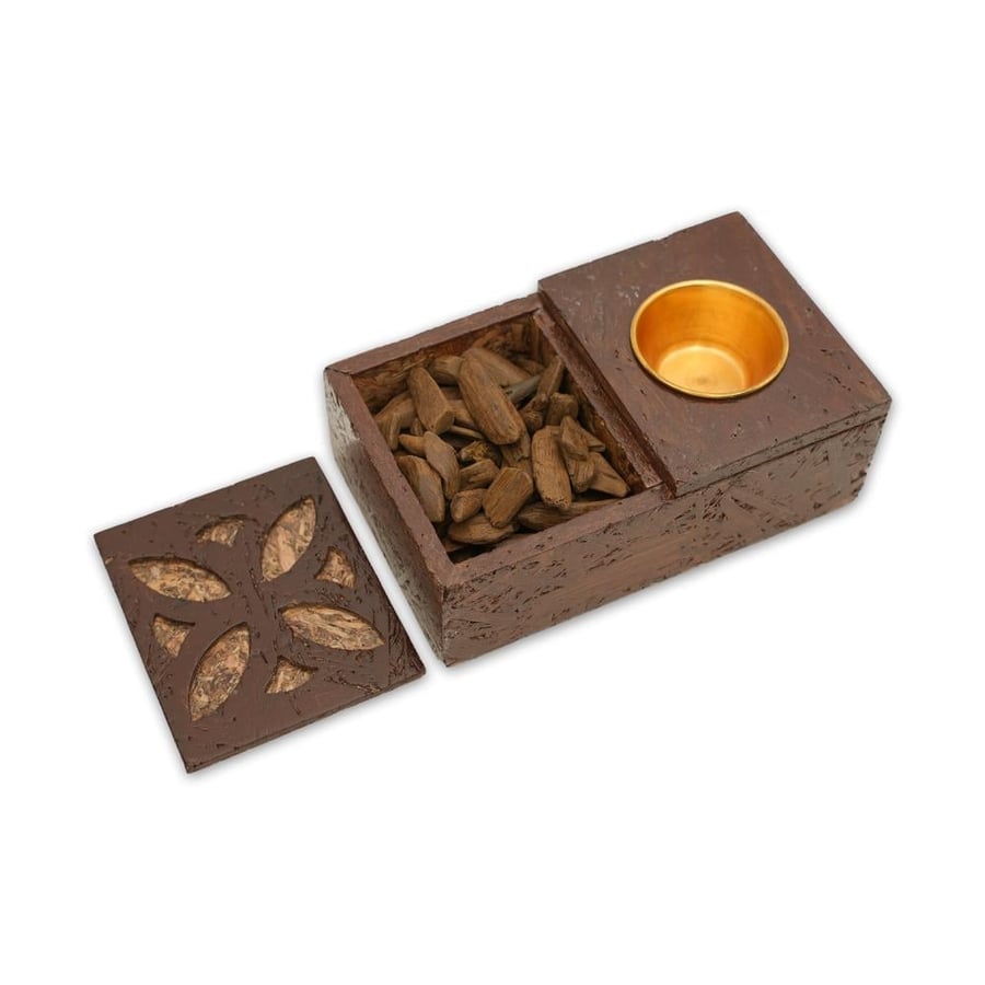 A box of incense and a Mideen incense burner