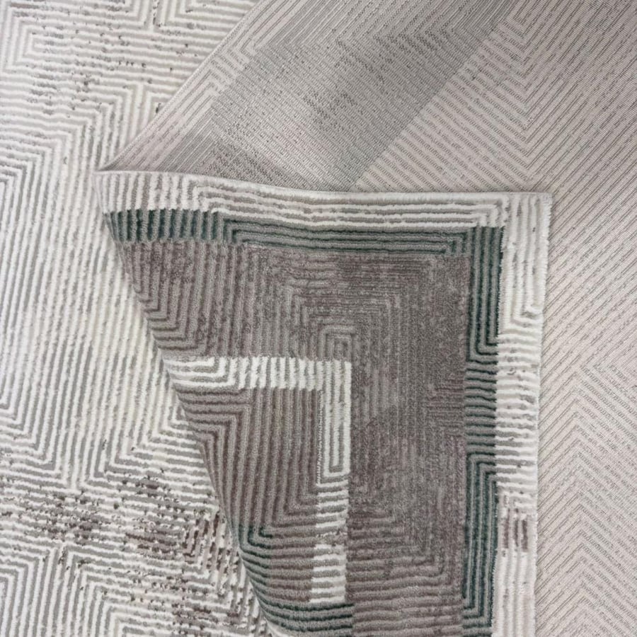 Luxury classic carpet in shades of brown and gray with elegant geometric details