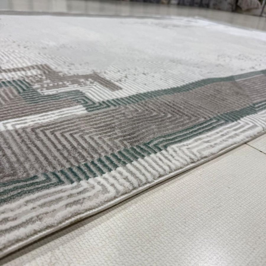 Luxury classic carpet in shades of brown and gray with elegant geometric details