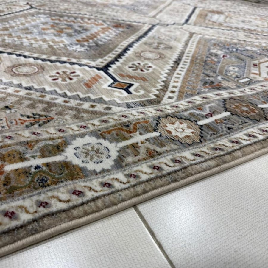 Luxury classic carpet in beige and gray shades with golden touches – elegant balanced design