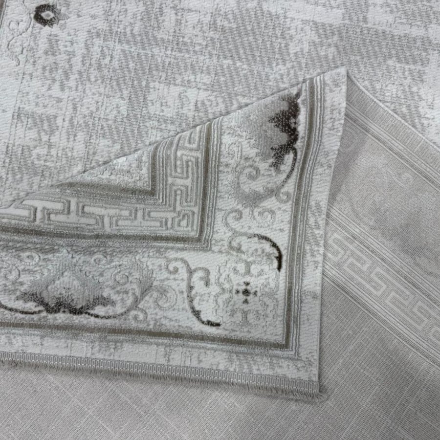 Luxury classic carpets in shades of silver and gray with elegant European decorations