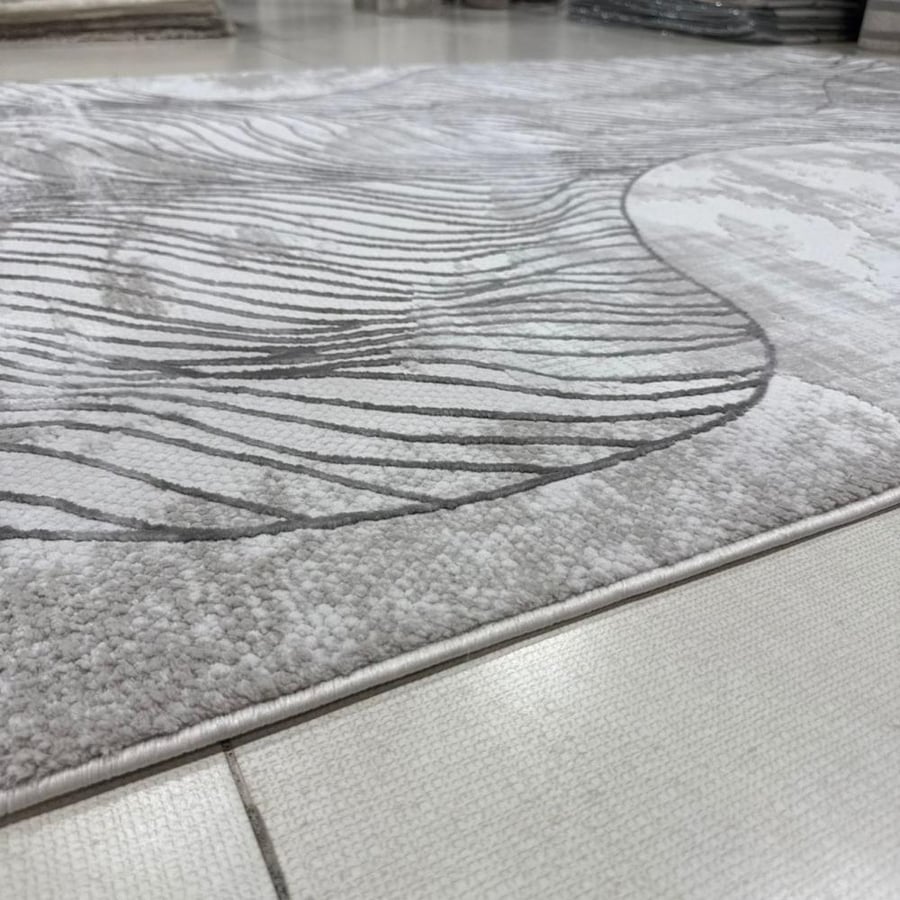 سجاد مودرن فني بخطوط انسيابية وتصميم تجريدي هادئ