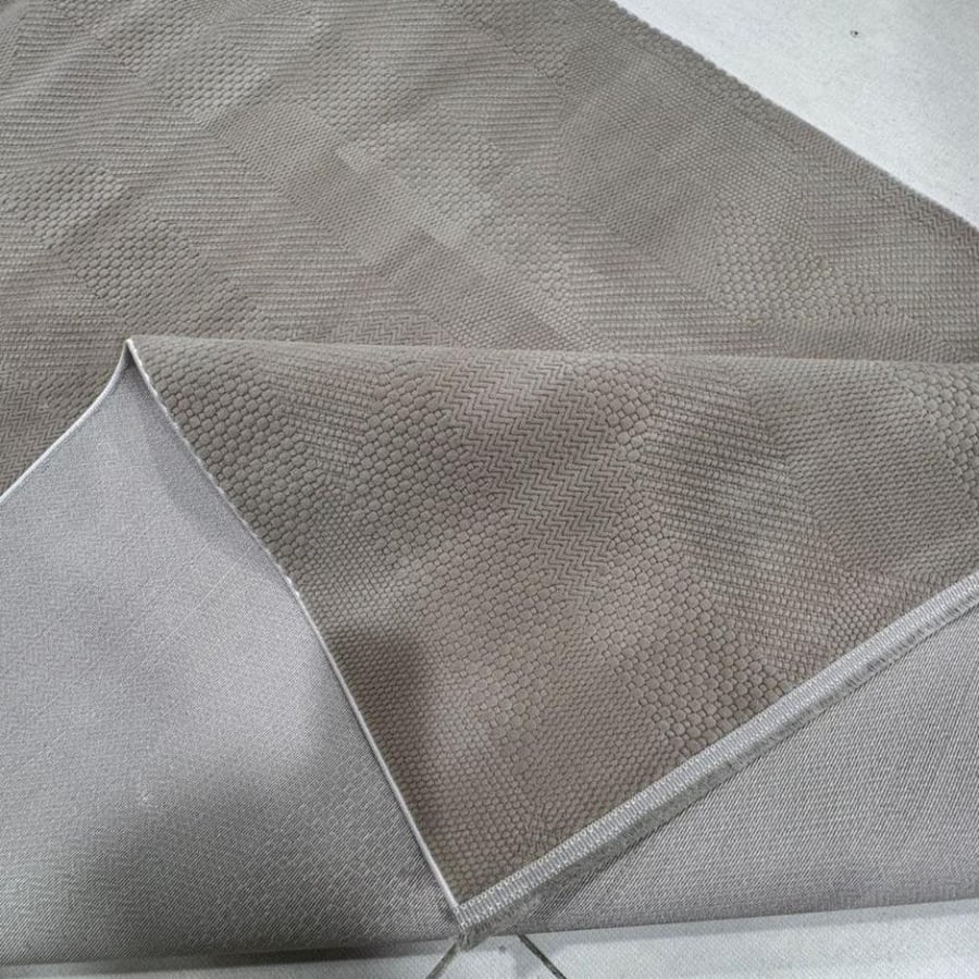 Modern simple carpet in warm taupe color with luxurious soft texture for contemporary majlises