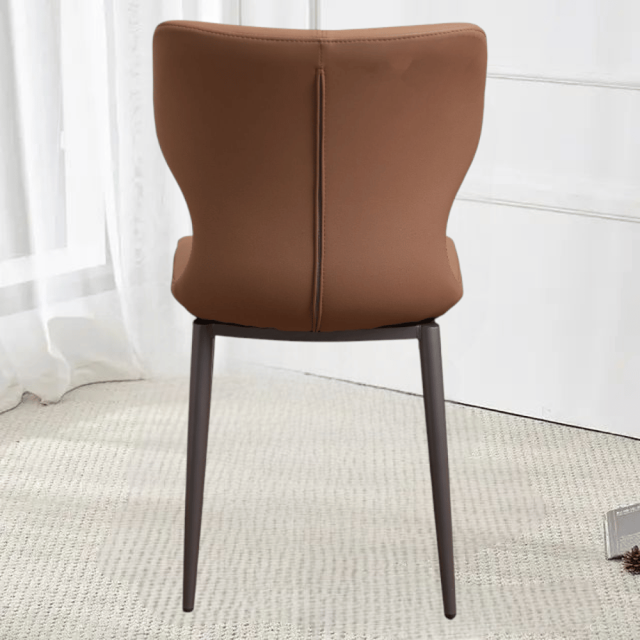 Orange leather dining chair with gray metal leg base