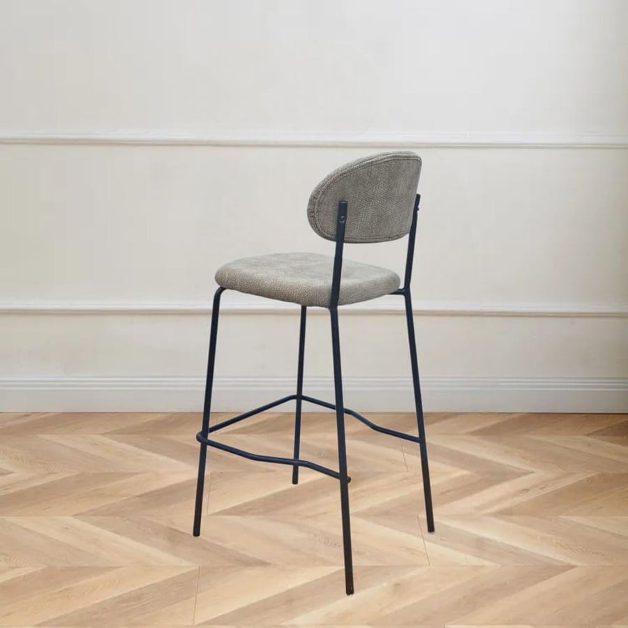 Gray fabric bar stool with a base of four black iron legs