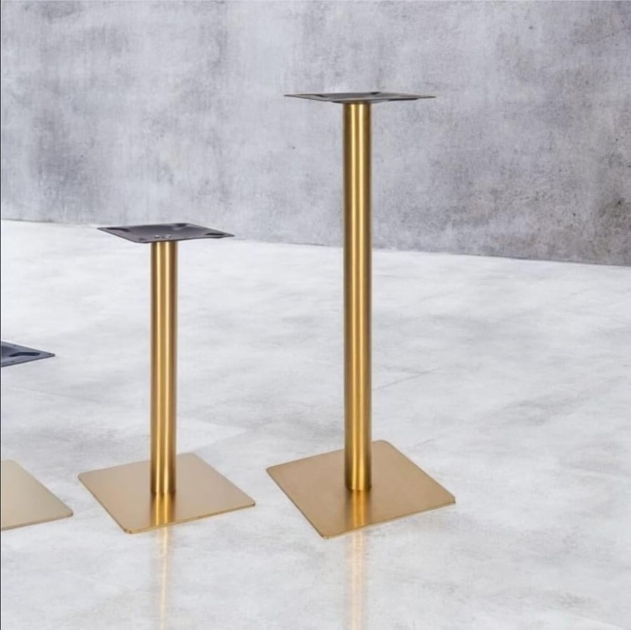 Gold stainless steel dining table base with black circular GWD1446